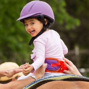 Client smiling on horse