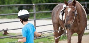 Therapeutic Riding - Child walking horse