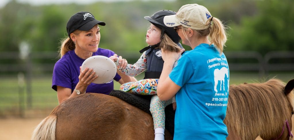 Therapeutic Riding - Client sitting on horse